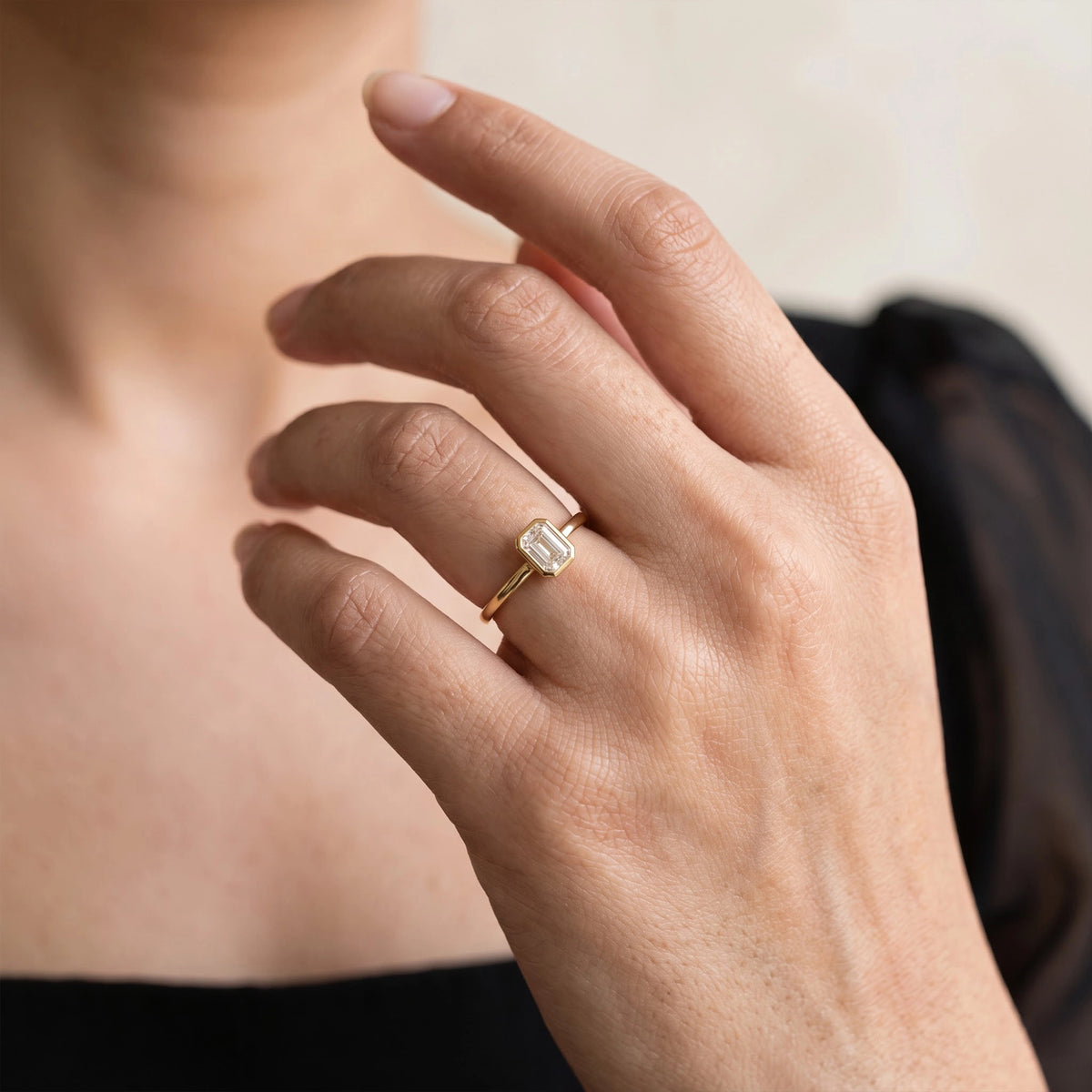Gold Emerald Cut Bezel Ring