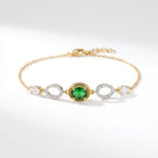 Gold Emerald Orbit Bracelet