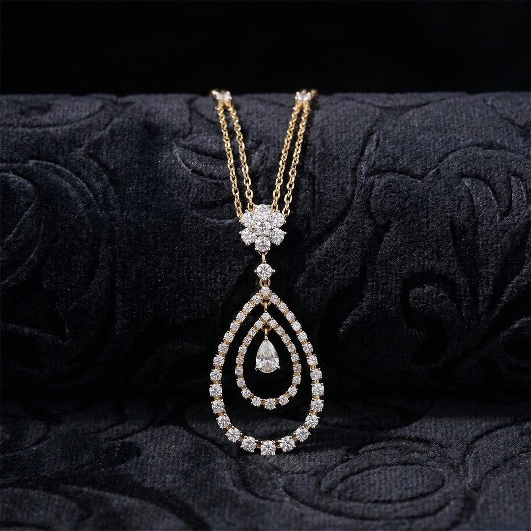 Gold Pear Halo Drop Necklace
