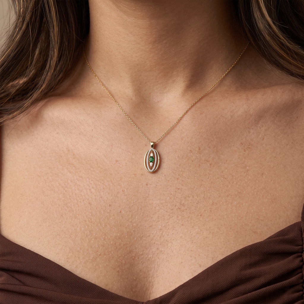 Gold Emerald Orbit Pendant