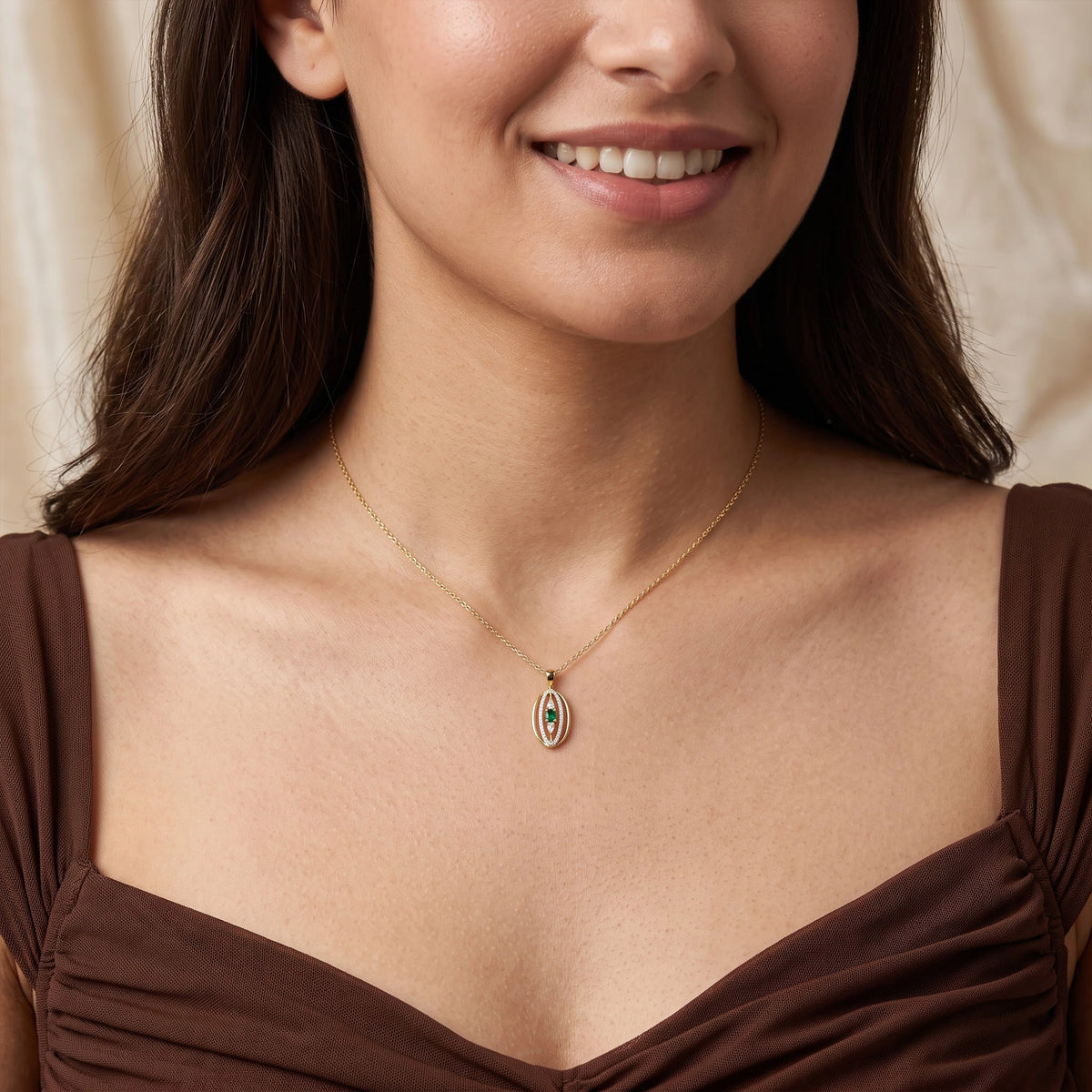 Gold Emerald Orbit Pendant