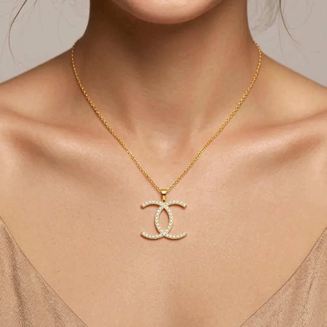 Gold Twin Curve CZ Pendant