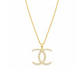 Gold Twin Curve CZ Pendant