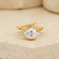Gold Pear Wrap Solitaire Ring