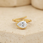 Gold Pear Wrap Solitaire Ring