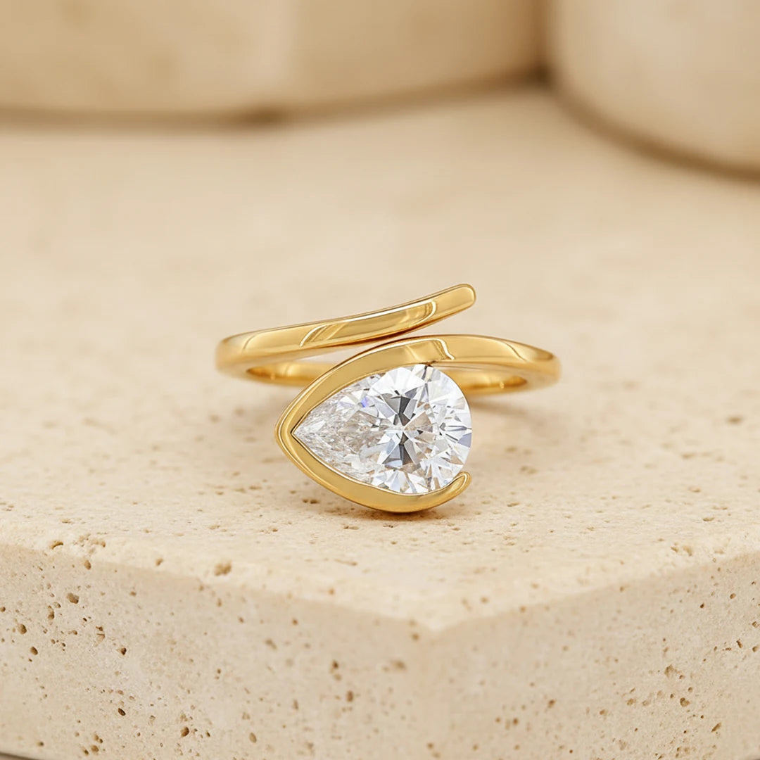Gold Pear Wrap Solitaire Ring
