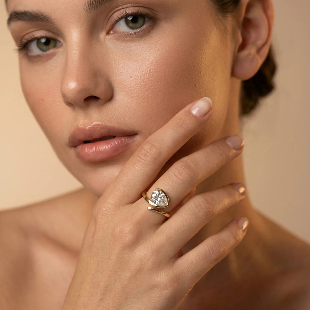 Gold Pear Wrap Solitaire Ring