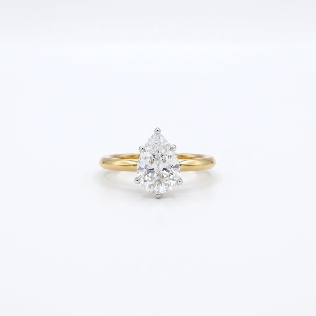 Gold Pear Solitaire Ring
