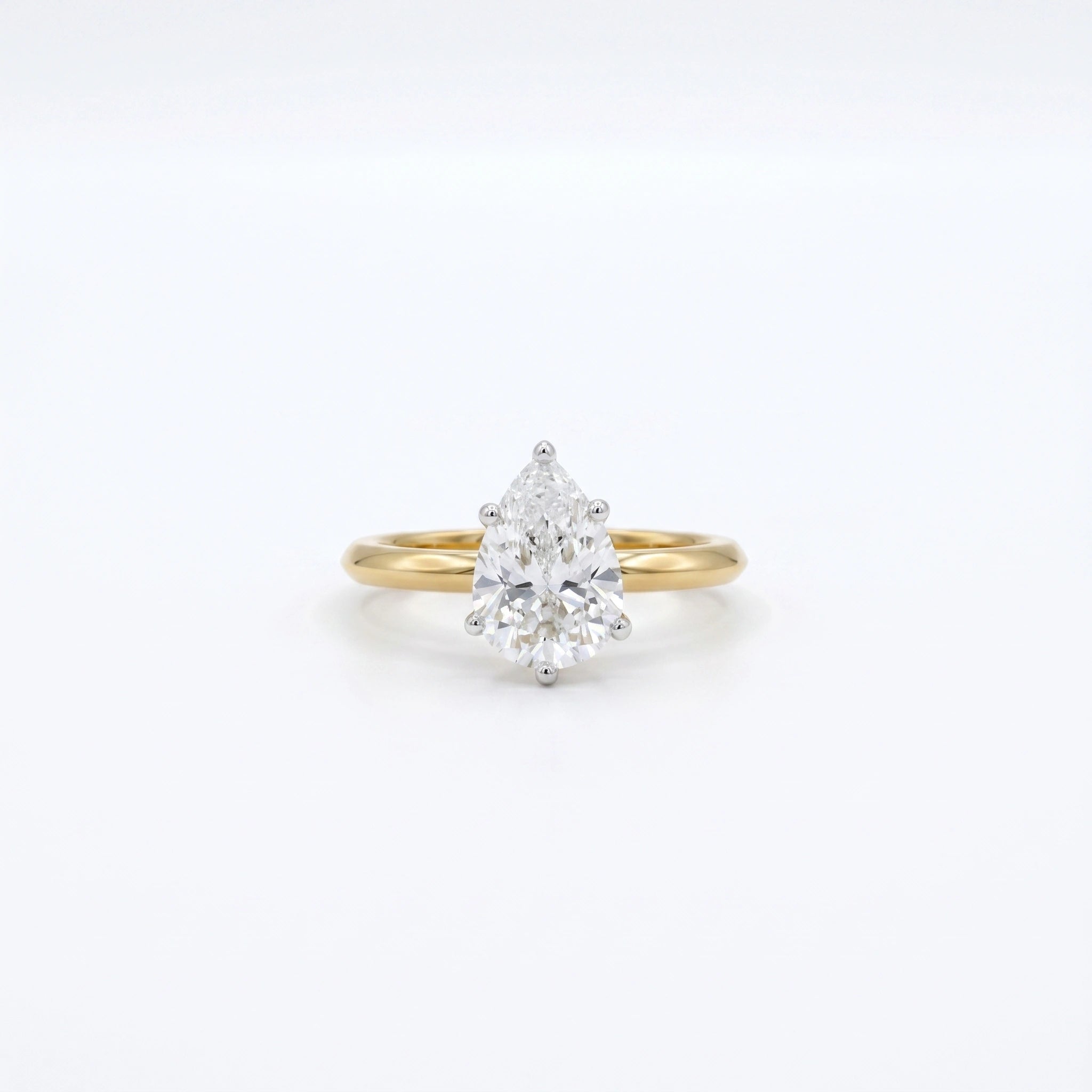 Gold Pear Solitaire Ring