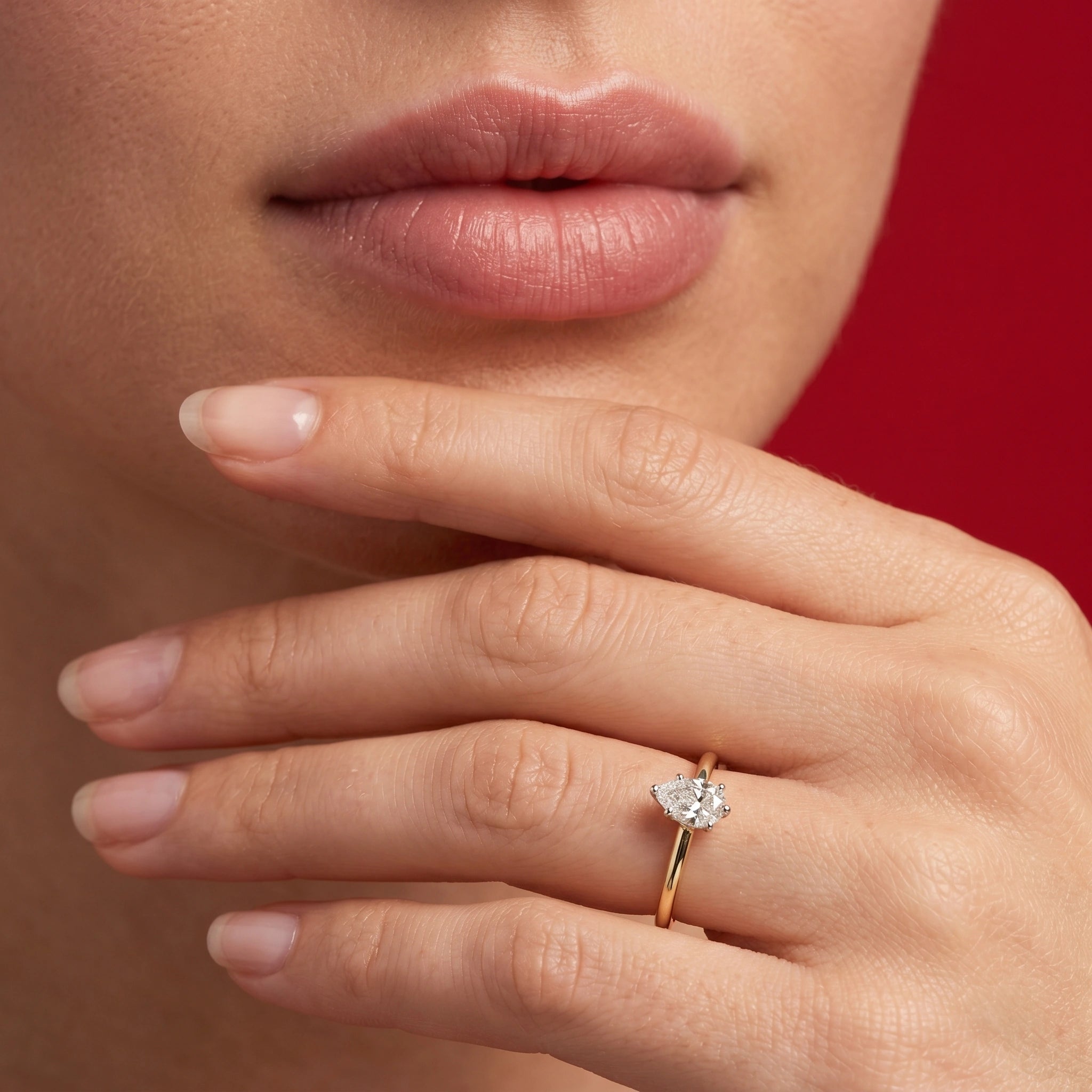 Gold Pear Solitaire Ring