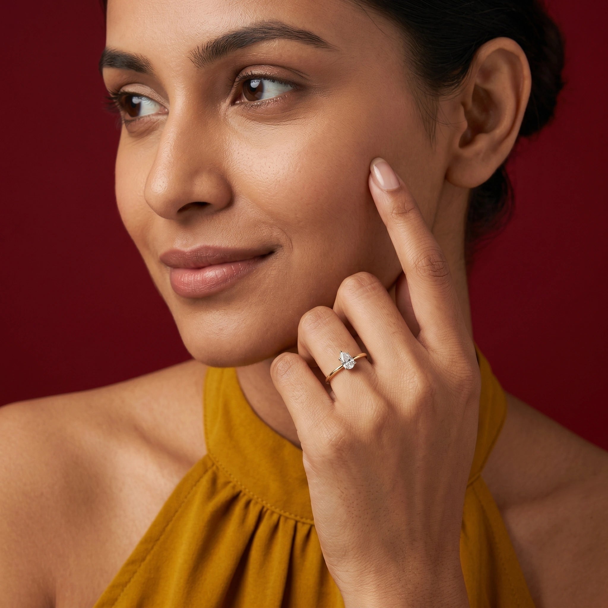 Gold Pear Solitaire Ring