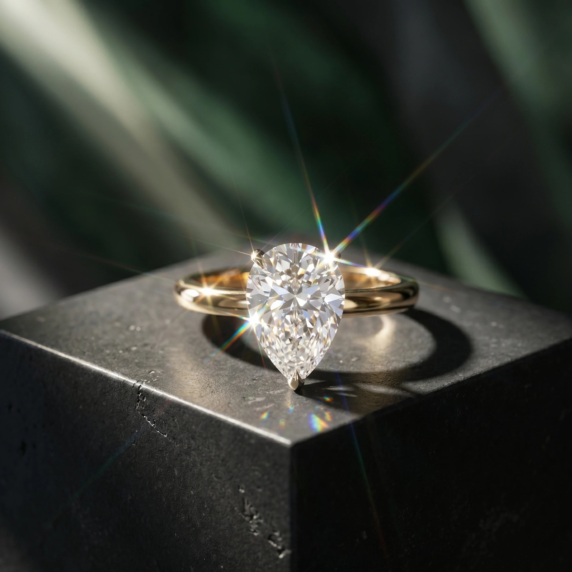 Gold Pear Solitaire Ring
