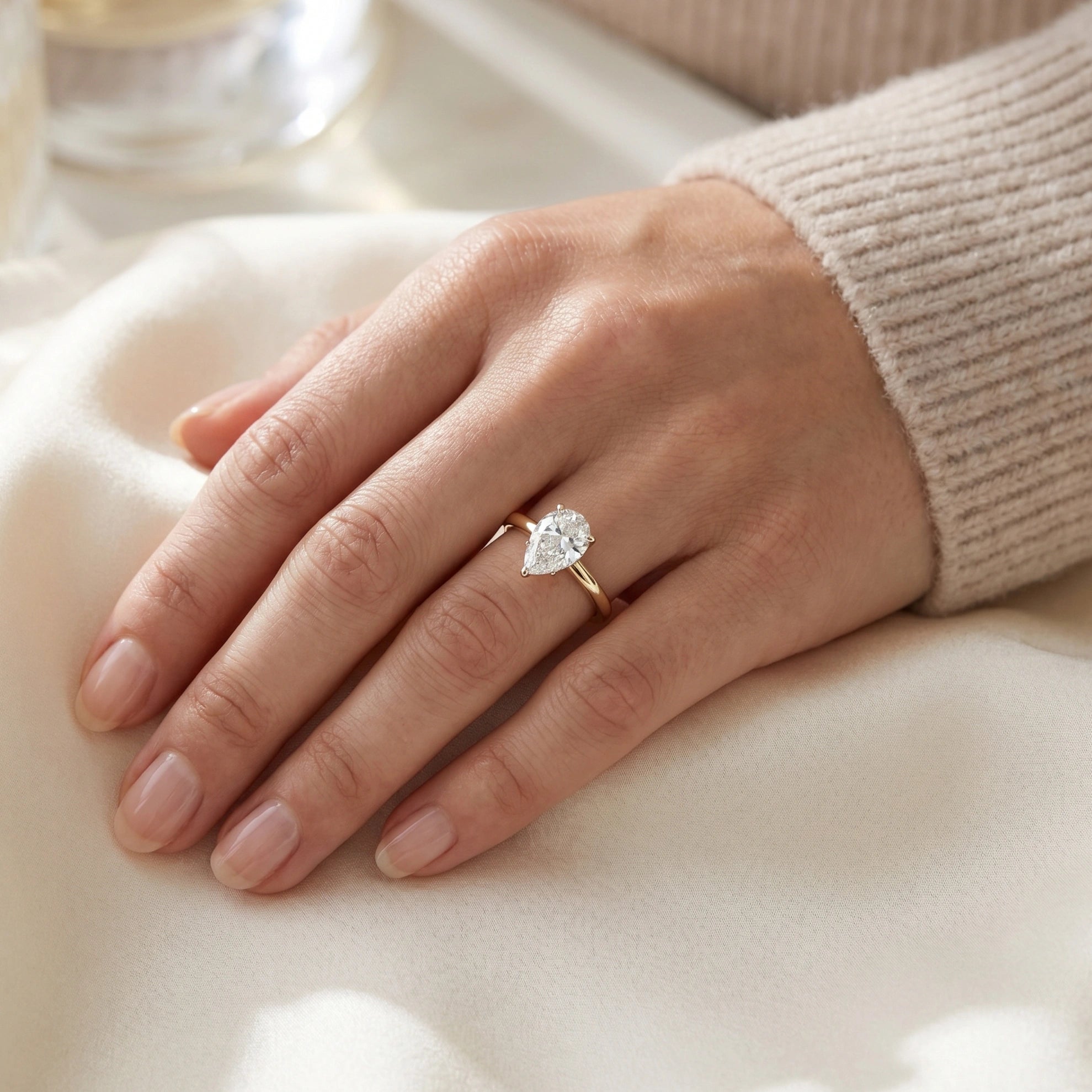 Gold Pear Solitaire Ring