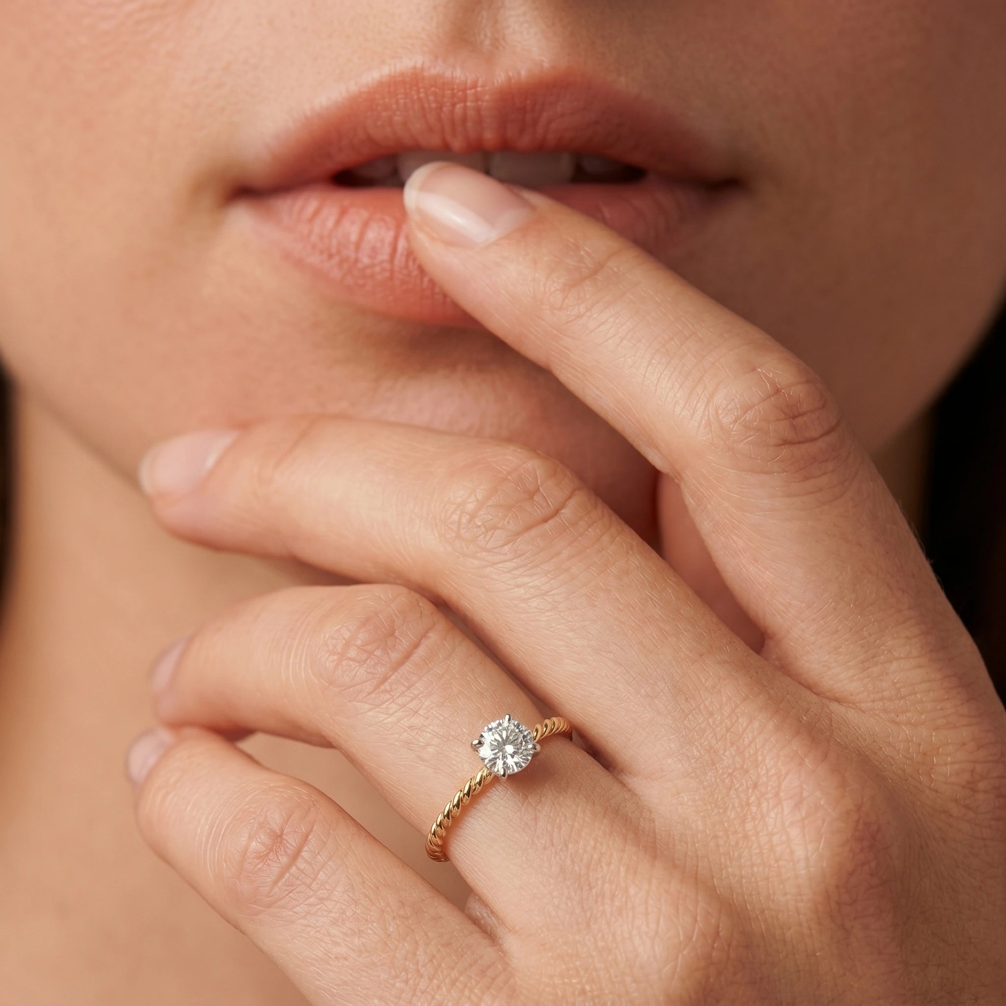 Gold Twisted Solitaire Ring