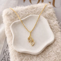 18KT Gold Twin Leaf Pendant