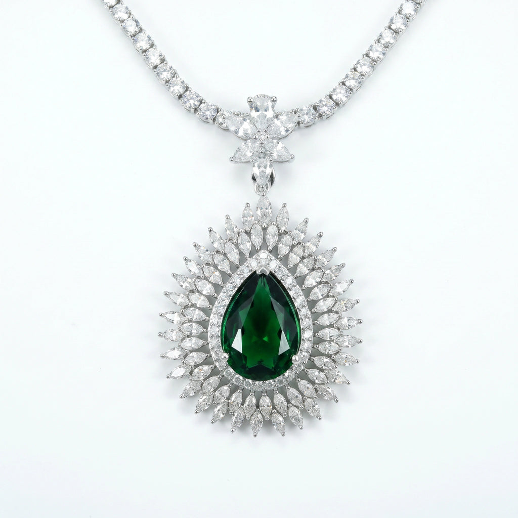 Emerald Sunburst Halo Pendant