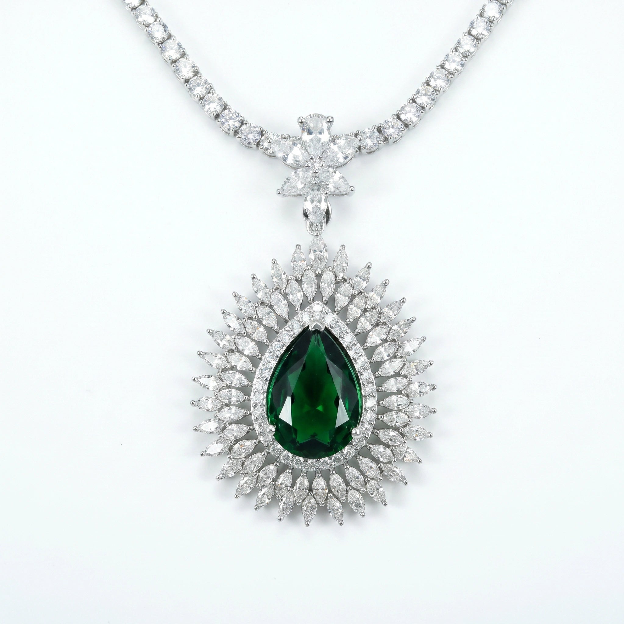Emerald Sunburst Halo Pendant