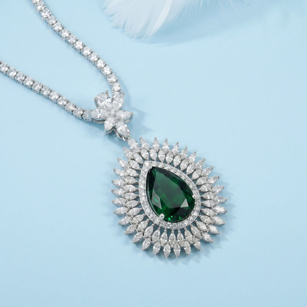 Emerald Sunburst Halo Pendant