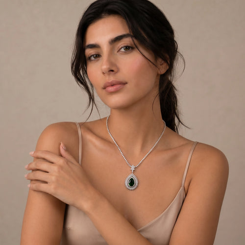 Emerald Sunburst Halo Pendant